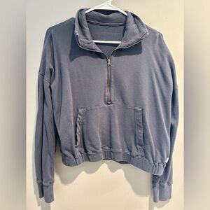 VUORI women’s sunny-side 1/2 zip pullover sweatshirt in azure blue. Size small